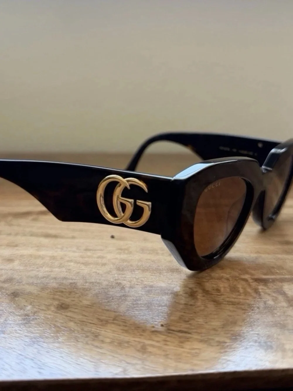 Gucci Black Cat-Eye Sunglasses with Gold GG Logo
